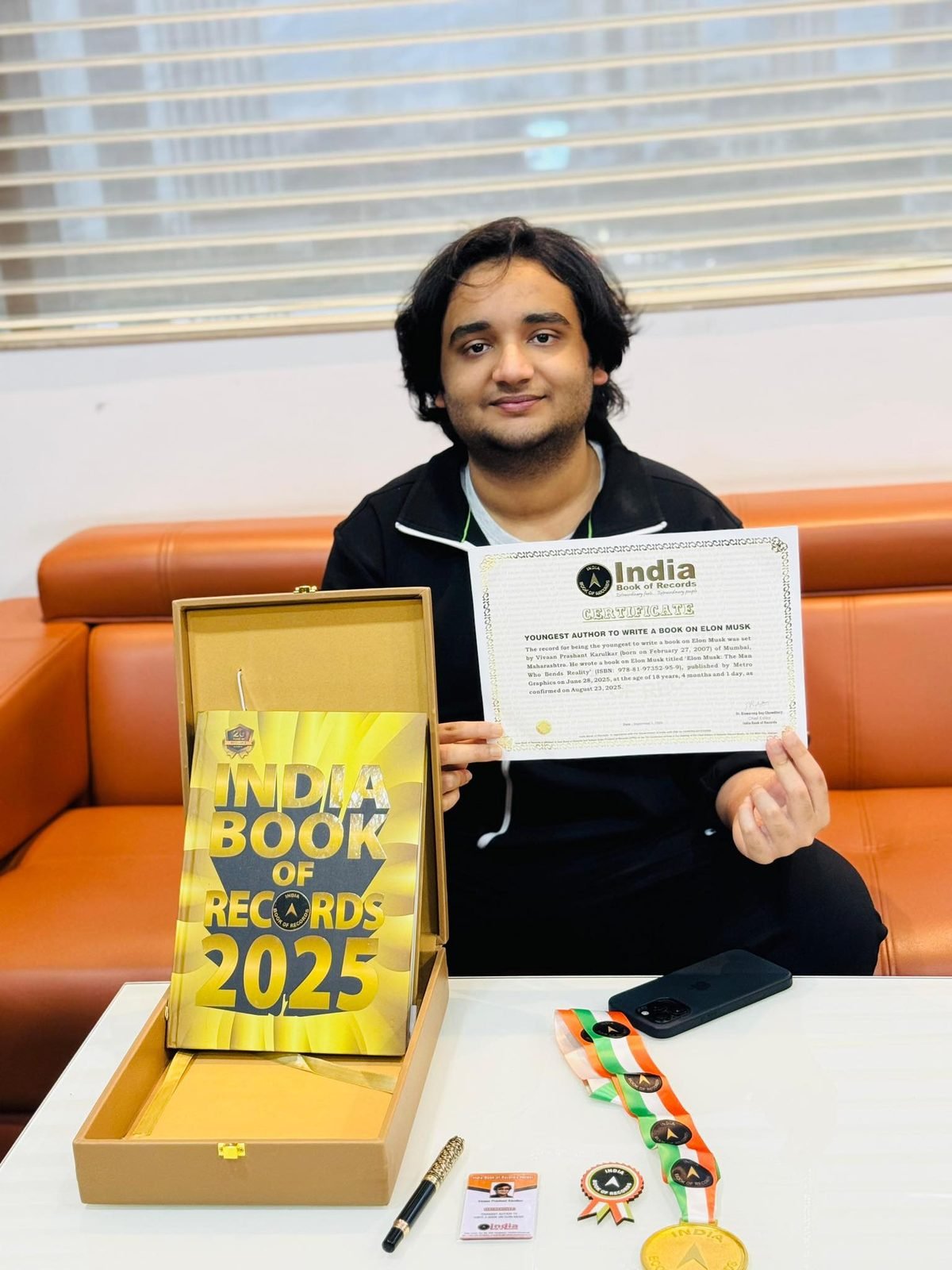 Vivaan Karulkar with the India Book of Records certificate for the Elon Musk biography