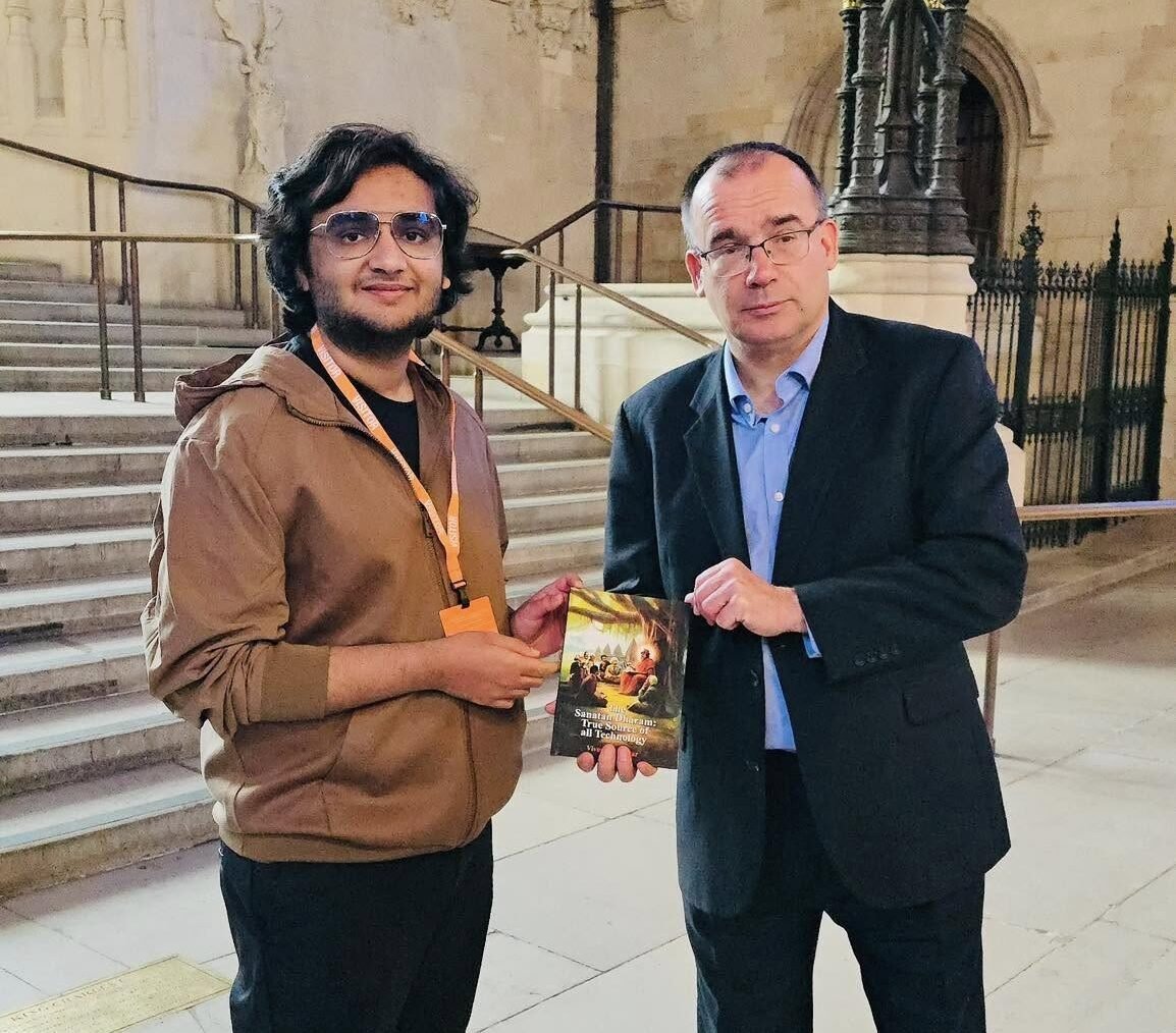 Vivaan Karulkar presenting his book at the UK Parliament in London