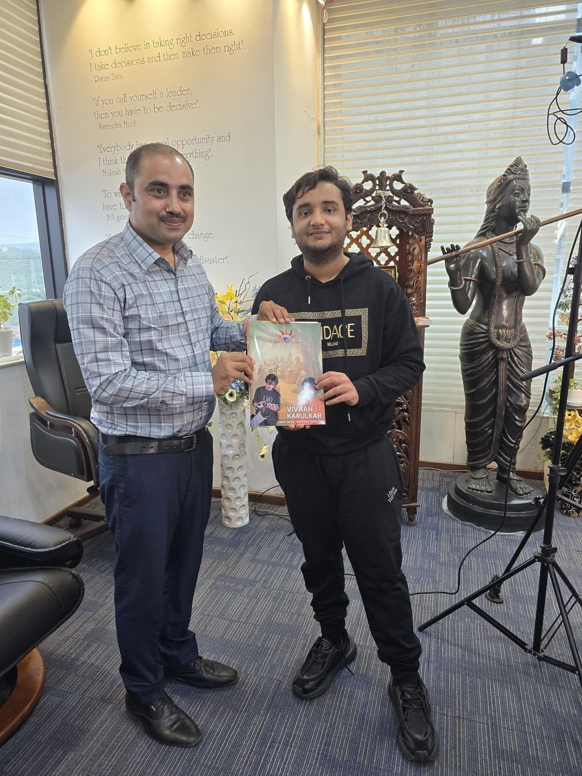 Vivaan Karulkar presenting Elon Musk: The Man Who Bends Reality at a launch event